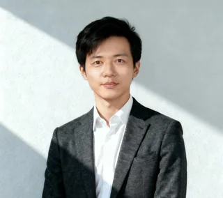海外事業責任者 Shawn